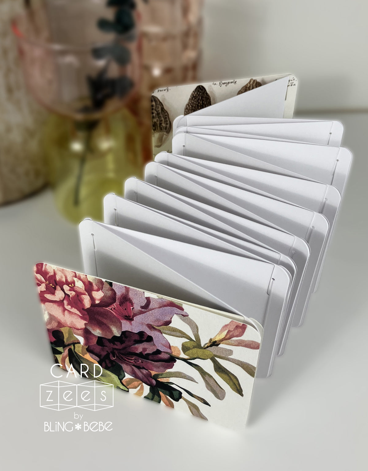 Beautiful CARDzees notebook, a scrapbook, a journal, a storybook, or a sketchbook. Paint, sketch, stamp or sticker, fold flat or expand to make an eye catching display. 