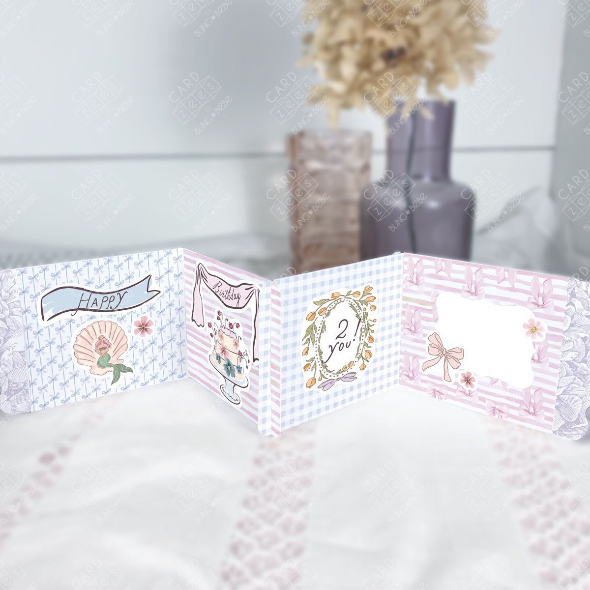 Cute stickers plus interlocking panels easily make a storybook-style unique birthday card. Greeting card with decorative elements on a textured surface